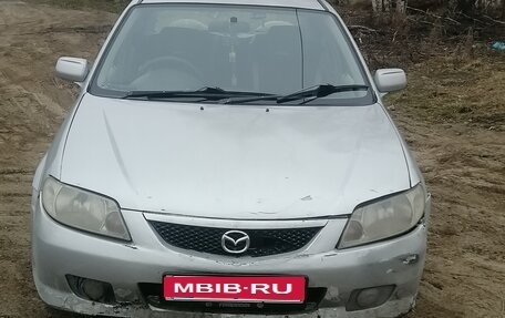 Mazda Familia, 2001 год, 400 000 рублей, 9 фотография