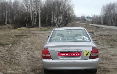 Mazda Familia, 2001 год, 400 000 рублей, 7 фотография