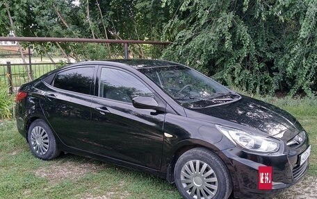 Hyundai Solaris II рестайлинг, 2013 год, 730 000 рублей, 3 фотография