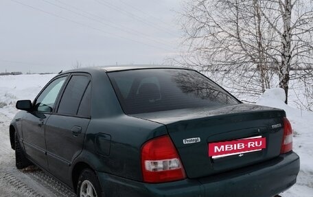Mazda Protege, 1999 год, 245 000 рублей, 8 фотография