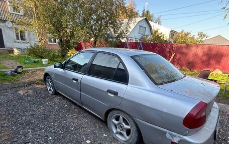 Mitsubishi Mirage VI рестайлинг, 2000 год, 150 000 рублей, 2 фотография