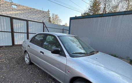 Mitsubishi Mirage VI рестайлинг, 2000 год, 150 000 рублей, 4 фотография