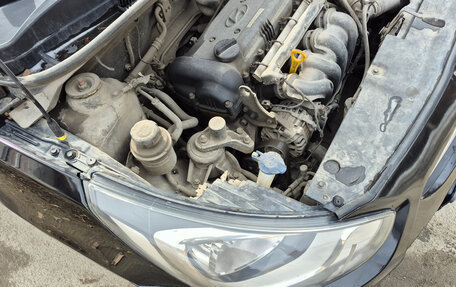 Hyundai Solaris II рестайлинг, 2011 год, 740 000 рублей, 13 фотография