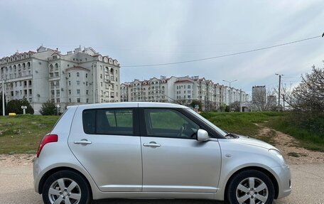 Suzuki Swift III, 2009 год, 777 000 рублей, 7 фотография