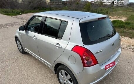 Suzuki Swift III, 2009 год, 777 000 рублей, 10 фотография