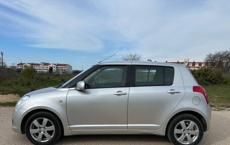 Suzuki Swift III, 2009 год, 777 000 рублей, 14 фотография