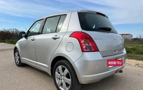 Suzuki Swift III, 2009 год, 777 000 рублей, 13 фотография