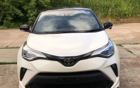 Toyota C-HR I рестайлинг, 2019 год, 2 200 000 рублей, 2 фотография