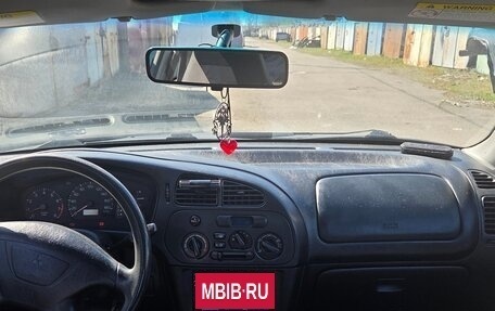 Mitsubishi Mirage VI рестайлинг, 2000 год, 190 000 рублей, 10 фотография