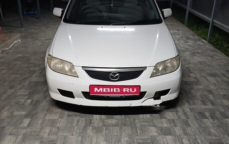 Mazda Familia, 2002 год, 225 000 рублей, 1 фотография