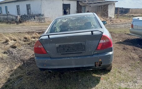 Mitsubishi Mirage VI рестайлинг, 1998 год, 55 000 рублей, 3 фотография