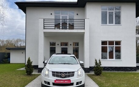 Cadillac SRX II рестайлинг, 2011 год, 900 000 рублей, 1 фотография