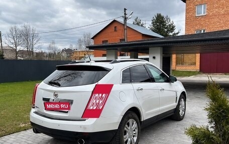 Cadillac SRX II рестайлинг, 2011 год, 900 000 рублей, 3 фотография