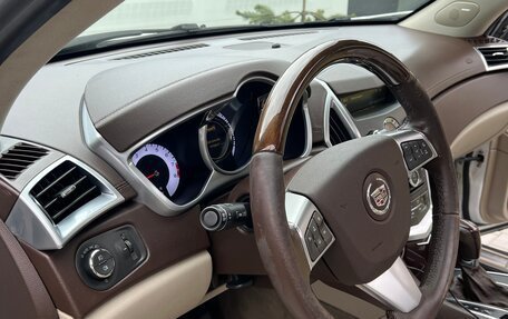 Cadillac SRX II рестайлинг, 2011 год, 900 000 рублей, 13 фотография