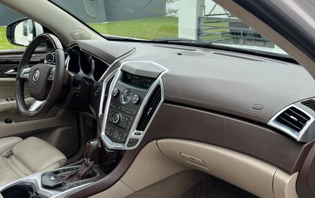 Cadillac SRX II рестайлинг, 2011 год, 900 000 рублей, 21 фотография