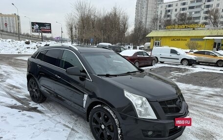 Cadillac SRX II рестайлинг, 2011 год, 700 000 рублей, 3 фотография