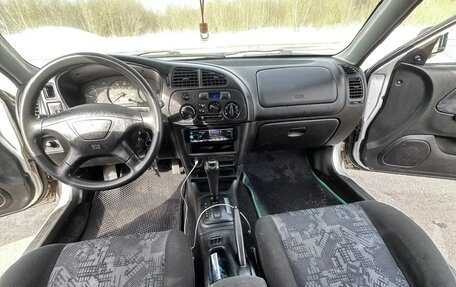 Mitsubishi Mirage VI рестайлинг, 2000 год, 251 000 рублей, 10 фотография
