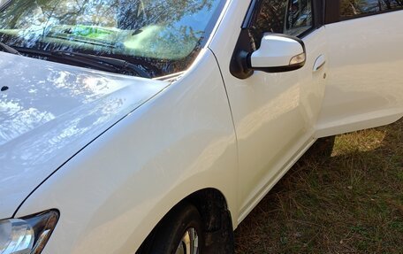 Renault Logan II, 2014 год, 700 000 рублей, 31 фотография