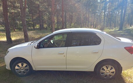 Renault Logan II, 2014 год, 700 000 рублей, 33 фотография