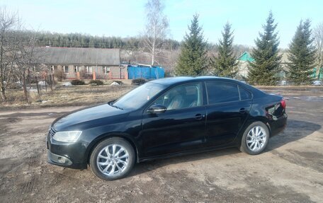 Volkswagen Jetta VI, 2011 год, 900 000 рублей, 8 фотография