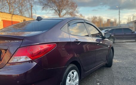 Hyundai Solaris II рестайлинг, 2011 год, 550 000 рублей, 10 фотография