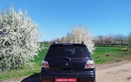 Mitsubishi Outlander III рестайлинг 3, 2009 год, 850 000 рублей, 7 фотография