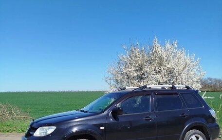 Mitsubishi Outlander III рестайлинг 3, 2009 год, 850 000 рублей, 11 фотография