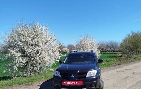 Mitsubishi Outlander III рестайлинг 3, 2009 год, 850 000 рублей, 13 фотография