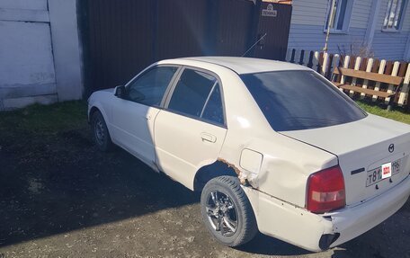 Mazda Familia, 1998 год, 145 000 рублей, 3 фотография