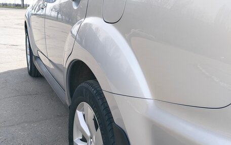 Mitsubishi Outlander III рестайлинг 3, 2012 год, 1 700 000 рублей, 12 фотография