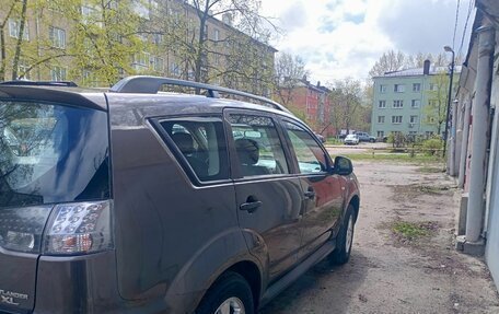 Mitsubishi Outlander III рестайлинг 3, 2010 год, 1 150 000 рублей, 2 фотография