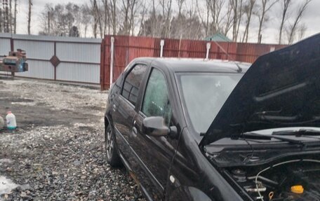 Renault Logan I, 2012 год, 450 000 рублей, 4 фотография