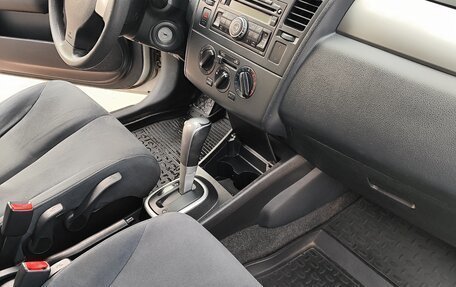 Nissan Tiida, 2010 год, 700 000 рублей, 8 фотография