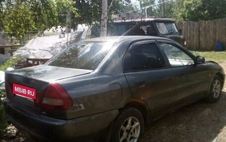 Mitsubishi Lancer VII, 1996 год, 70 000 рублей, 11 фотография