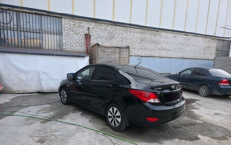 Hyundai Solaris II рестайлинг, 2011 год, 650 000 рублей, 3 фотография