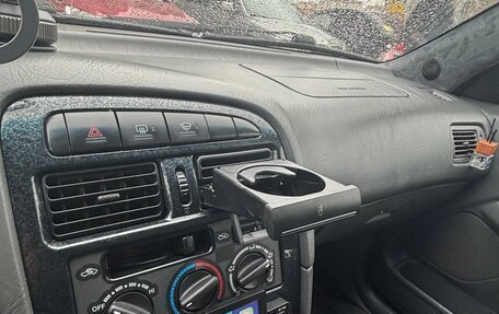 Toyota Avensis III рестайлинг, 1998 год, 420 000 рублей, 9 фотография