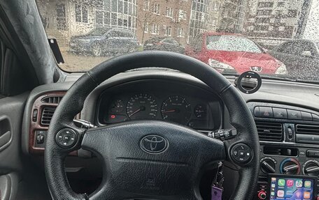 Toyota Avensis III рестайлинг, 1998 год, 420 000 рублей, 11 фотография