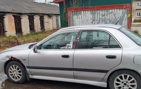 Mitsubishi Carisma I, 2002 год, 360 000 рублей, 18 фотография