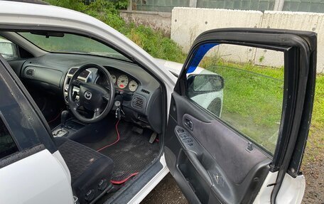 Mazda Familia, 2001 год, 340 000 рублей, 9 фотография