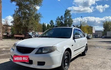 Mazda Familia, 2001 год, 340 000 рублей, 7 фотография