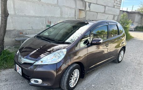 Honda Fit III, 2012 год, 900 000 рублей, 10 фотография