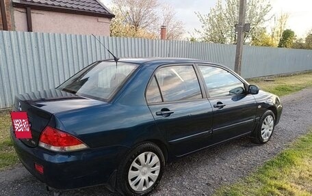 Mitsubishi Lancer IX, 2006 год, 395 000 рублей, 11 фотография