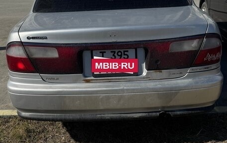 Mazda Familia, 1997 год, 135 000 рублей, 3 фотография