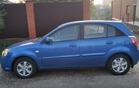 KIA Rio II, 2011 год, 650 000 рублей, 3 фотография