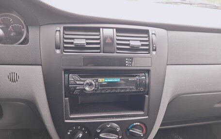 Daewoo Gentra II, 2013 год, 670 000 рублей, 29 фотография