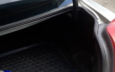 Toyota Avensis III рестайлинг, 2004 год, 600 000 рублей, 6 фотография