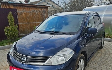 Nissan Tiida, 2010 год, 565 000 рублей, 9 фотография