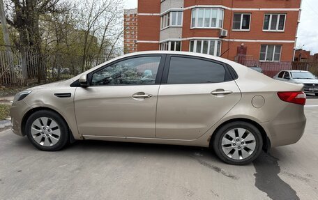 KIA Rio III рестайлинг, 2012 год, 750 000 рублей, 21 фотография