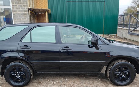 Lexus RX IV рестайлинг, 2000 год, 710 000 рублей, 5 фотография