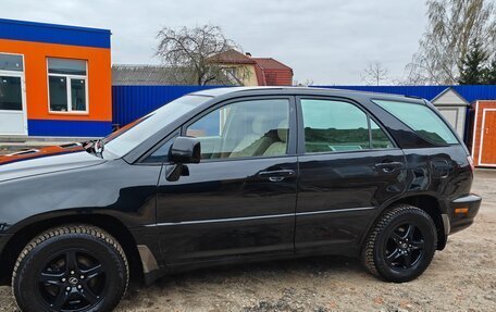 Lexus RX IV рестайлинг, 2000 год, 710 000 рублей, 6 фотография
